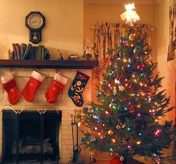 Why do Brits put up a Christmas tree in their home?