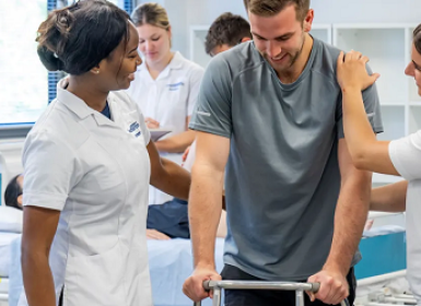 Southampton Nursing students with patient using a walker